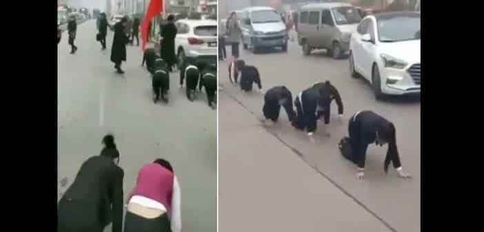 ChineDes employés forcés à ramper dans la rue La raison - Chine : Des employés forcés à ramper dans la rue. La raison!(vidéo)