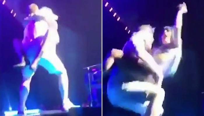 Lady Gaga fait une chute plein concert fan Vidéo - Lady Gaga fait une chute en plein concert avec un fan (Vidéo)