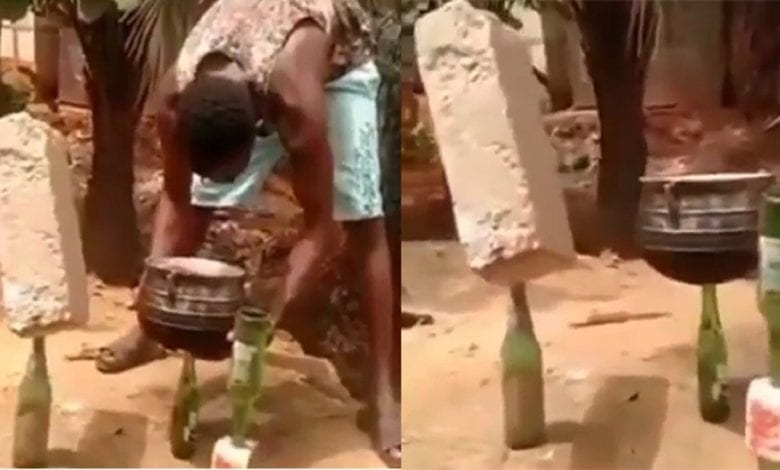 Ghana: Un Homme Suspend Une Marmite Et Une Brique Sur Des Bouteilles (Vidéo)